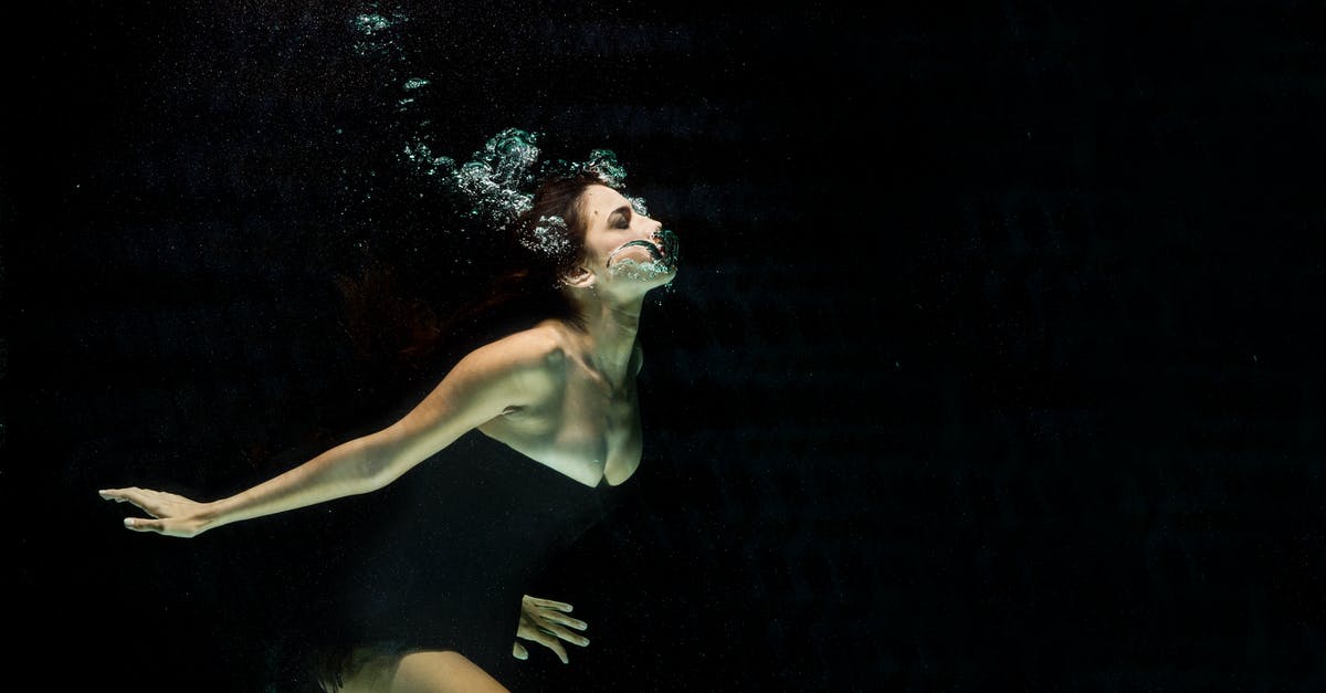 1990s TV series featuring underwater habitat and girl with the ability to breathe underwater? [closed] - Woman Wearing Black Dress Under Water Photography