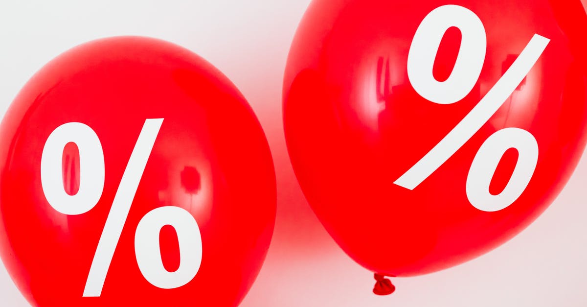 2.4:1 aspect ratio [closed] - Two Red Balloons With Percentage Symbols on White Background