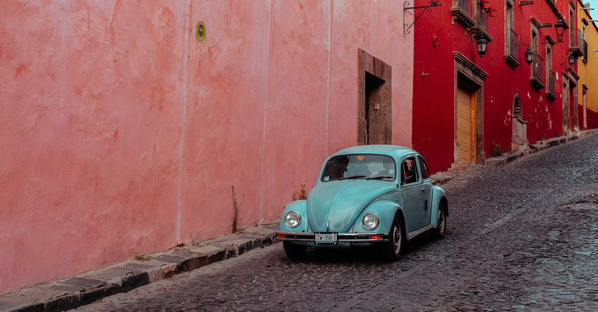 'Lost' follow along resources? - Turquoise Buggy Moving Along Street with Pink and Red Buildings