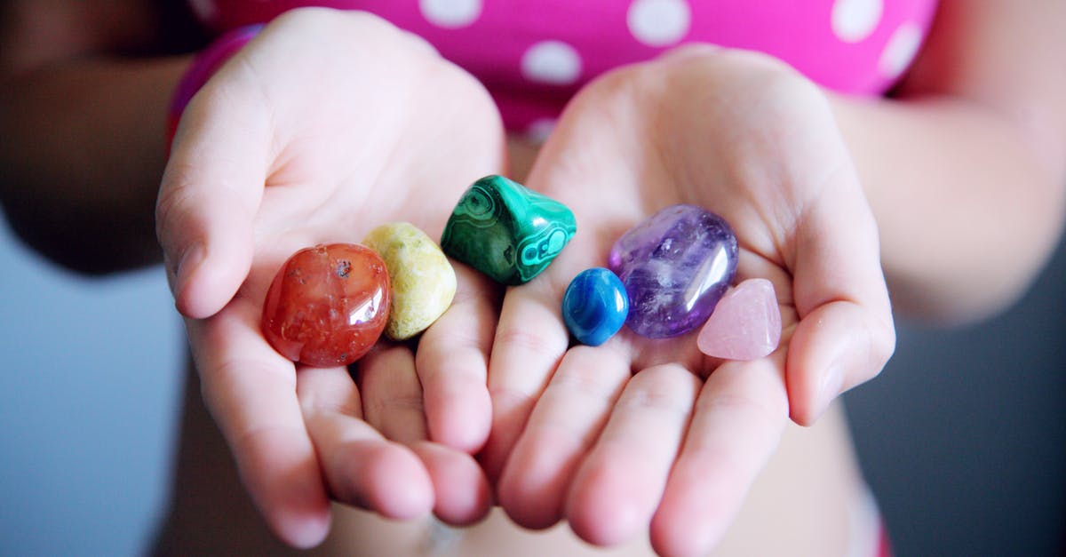 Any differences between The Avengers releases? - Woman Holding Six Polished Stones