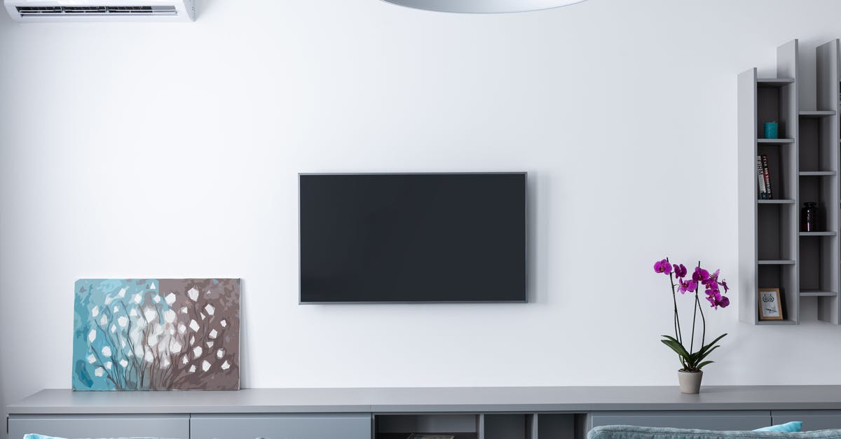 Apple TV "See" series - are the knots a real form of communication? - Contemporary living room decorated with purple flowers and rectangular shaped shelves handing on wall