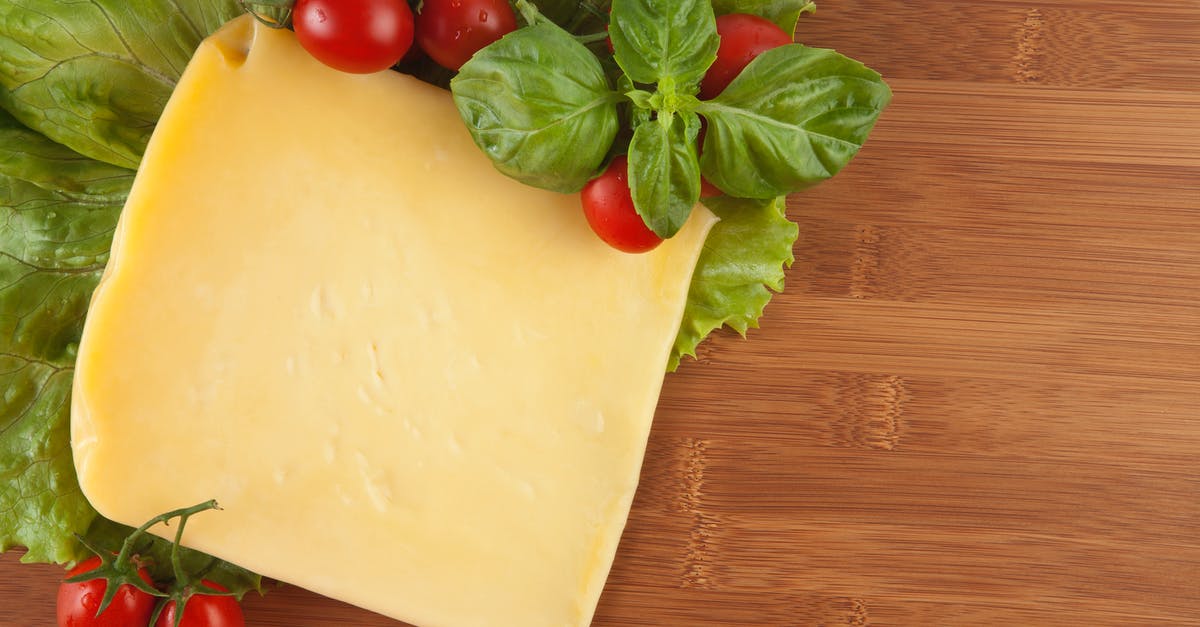 Appropriate cheese amount - Red Cherry Tomatoes Beside Yellow Cheese