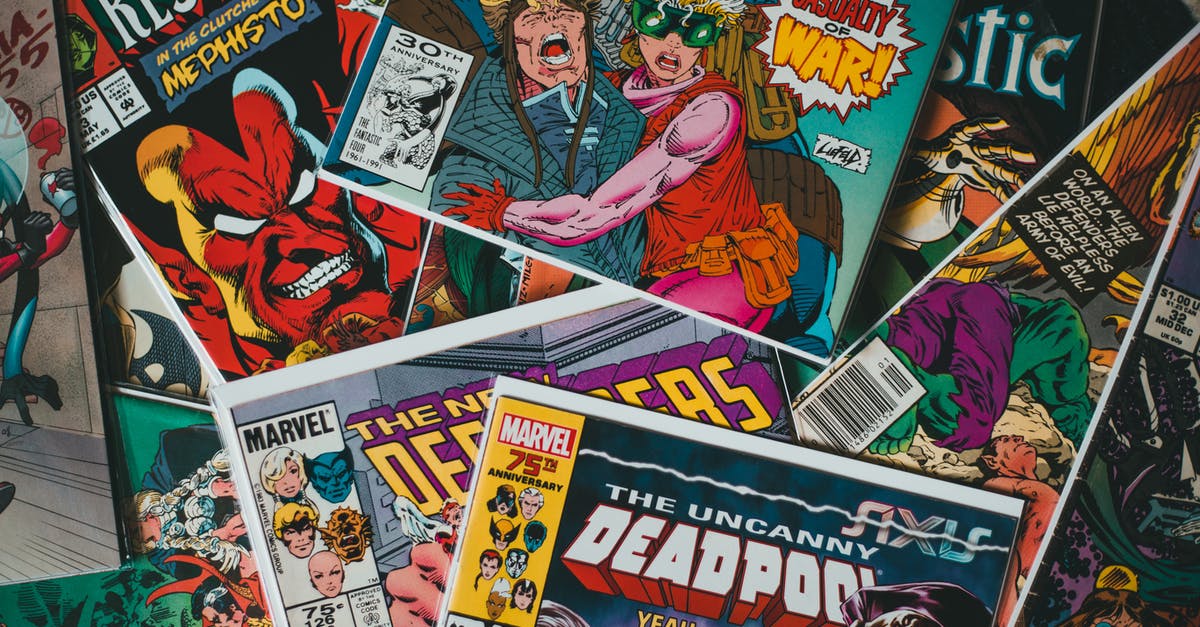 Are any of Peter Parker's early costume designs allusions to the comic books? - From above pile of collection of various famous comic books with colorful covers