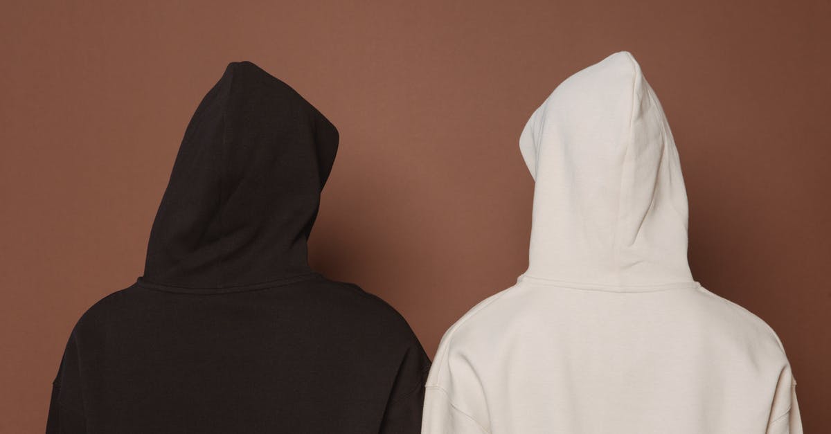 Are modern black & white movies shot in colour? - Models and black and white hoodies in studio
