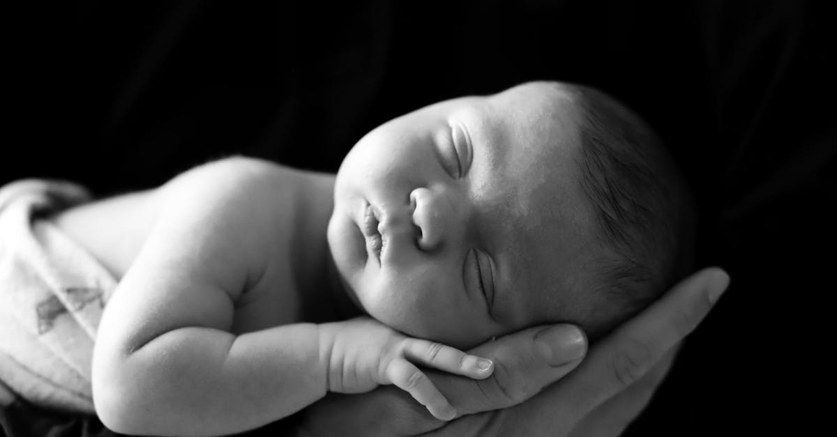Are newborn babies infected? - Grayscale Photo of Baby Sleeping