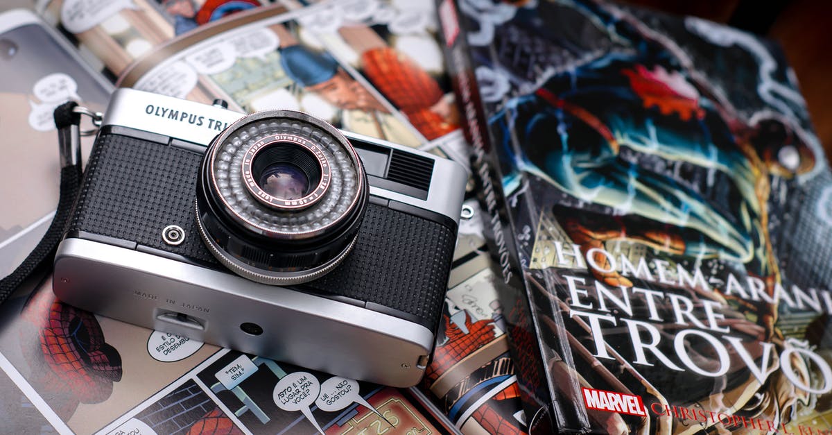 Are the comic strips in the Marvel logo relevant to each film? - Comic books and photo camera