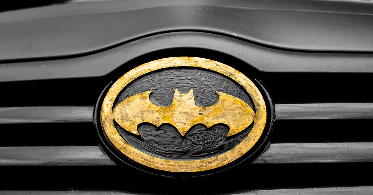 Are there any other Batman cartoons that are adapted directly from a comic? - Black and Brown Batman Emblem Close-up Photography
