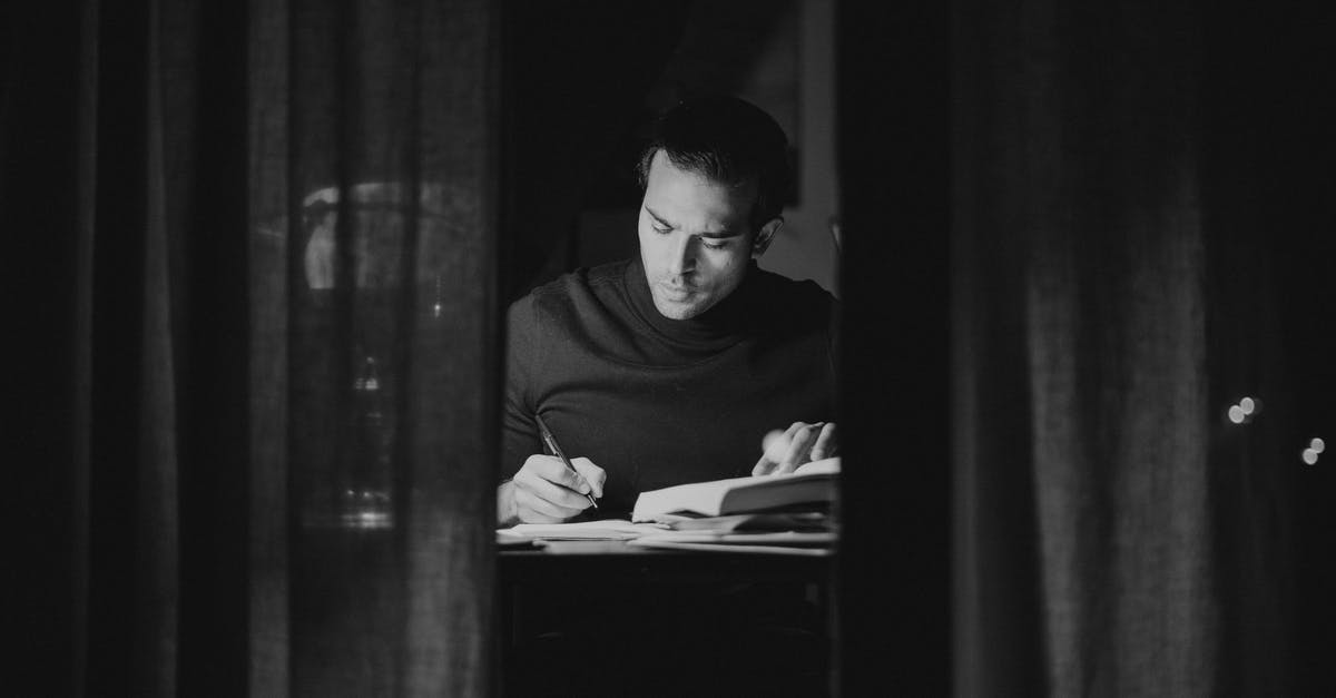 Black Mirror - clever writing or me being cynical - Pensive man writing in notebook and reading book