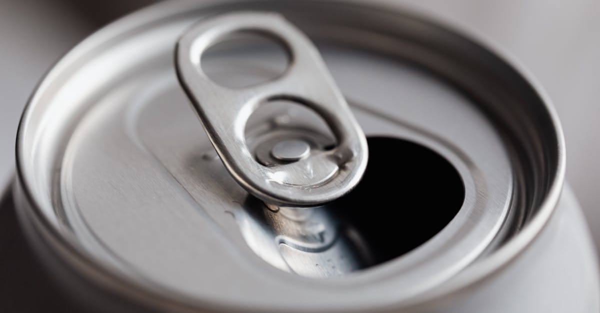 Can you really drink from Root Beer Barrels? - Open grey metal soda can