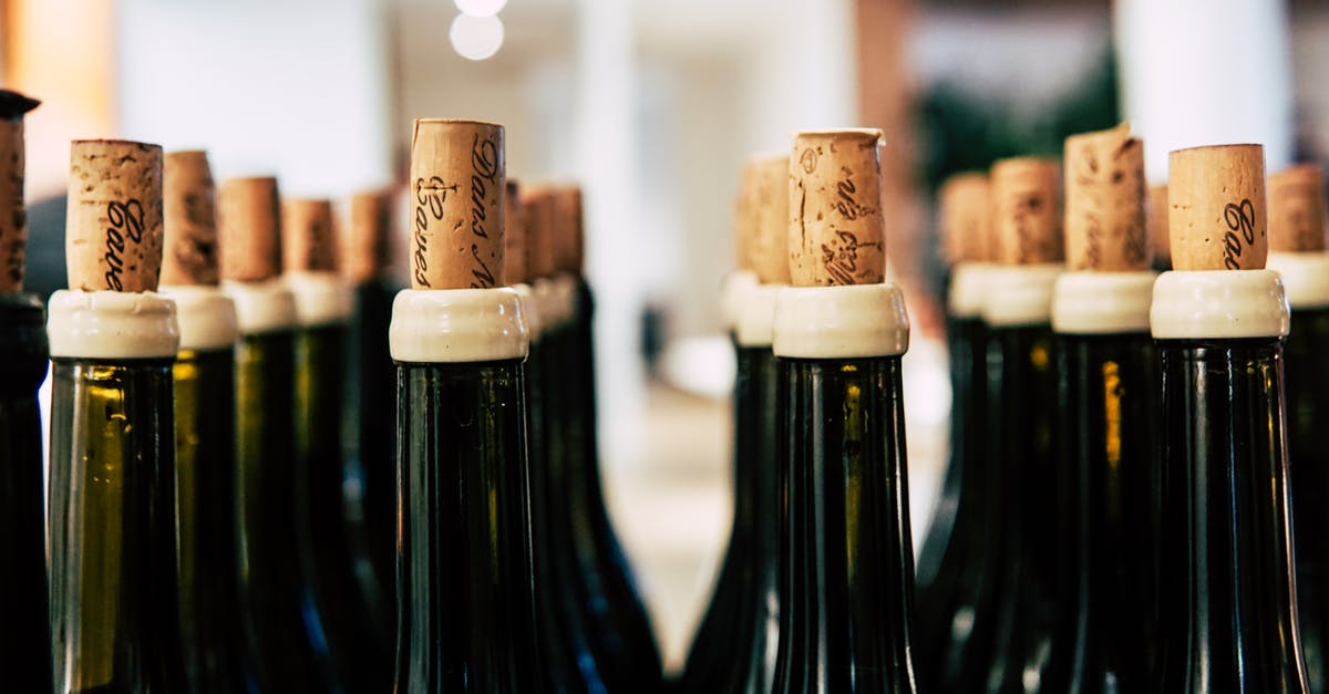Chained up in the basement movie, comedy (maybe)? [closed] - Close-up Photo of Wine Bottles With Cork
