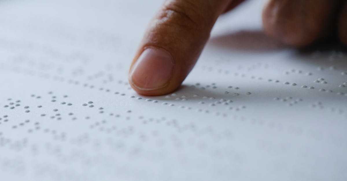 Confusing plot point in The Sense of an Ending - Photo of Person Pointing on Braille