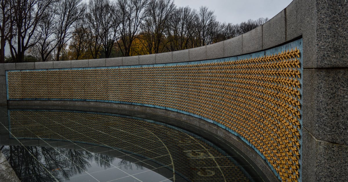 Contradictions in Star Wars about advocating pacifism? - Golden stars on Freedom Wall at World War II Memorial located in in National Mall in Washington DC against gloomy sky