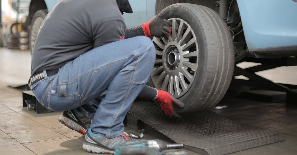 Crossing your own timeline, changing the future - how does that work? - Man Changing a Car Tire