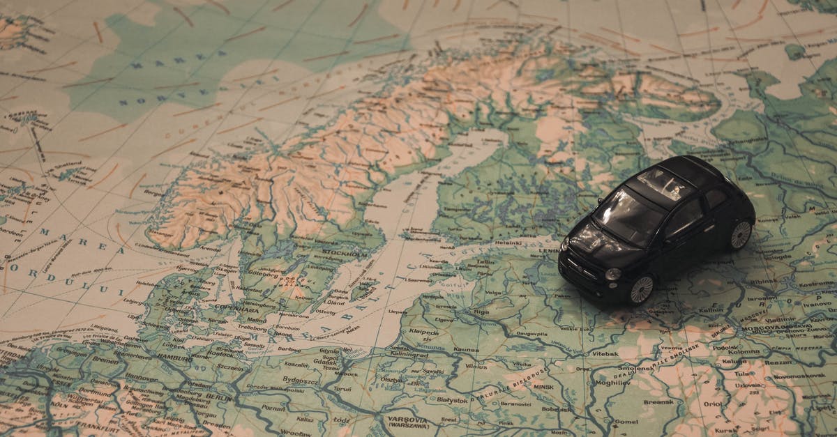 Deadpool uncensored in Sweden? - Black Toy Car on World Map Paper
