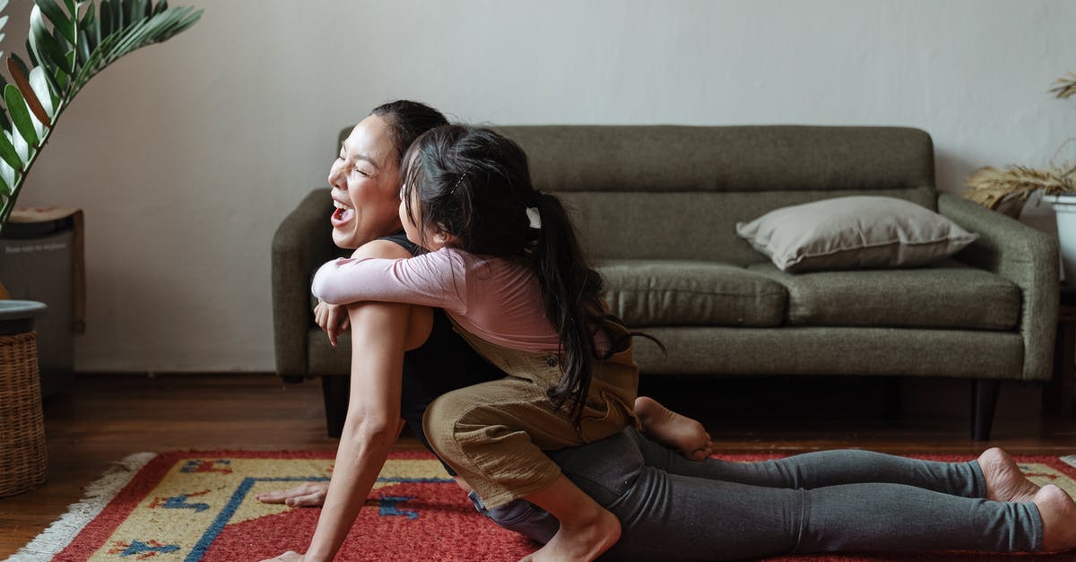 Did Hannah Wells' have a 'story'? - Photo of Girl Hugging a Woman While Doing Yoga Pose