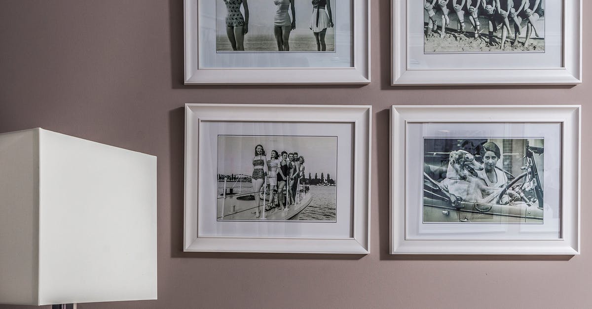 Did Jack Starks regain his memory after being shot? - Collection of framed photos on wall