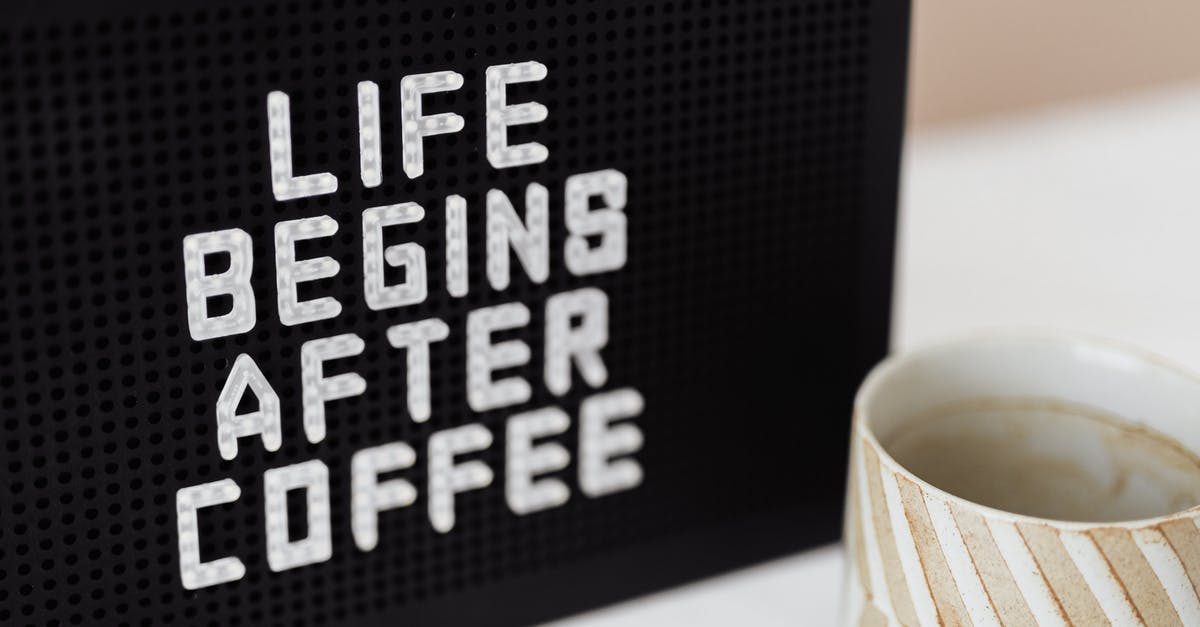 Did the Fresh Prince producers ever consider reshooting the title sequence? - Peg message board with Life Begins After Coffee motto and empty ceramic cup of coffee with creative striped design on white table