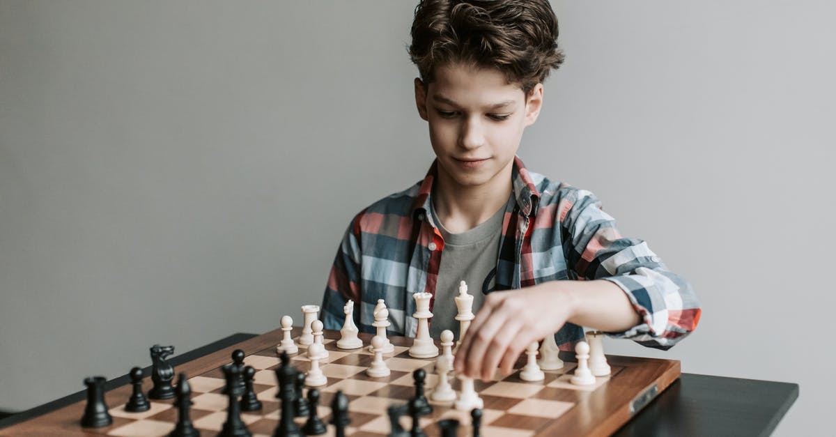 Did the young boy move the broom through the Force? - A Boy Making a Move in a Game of Chess