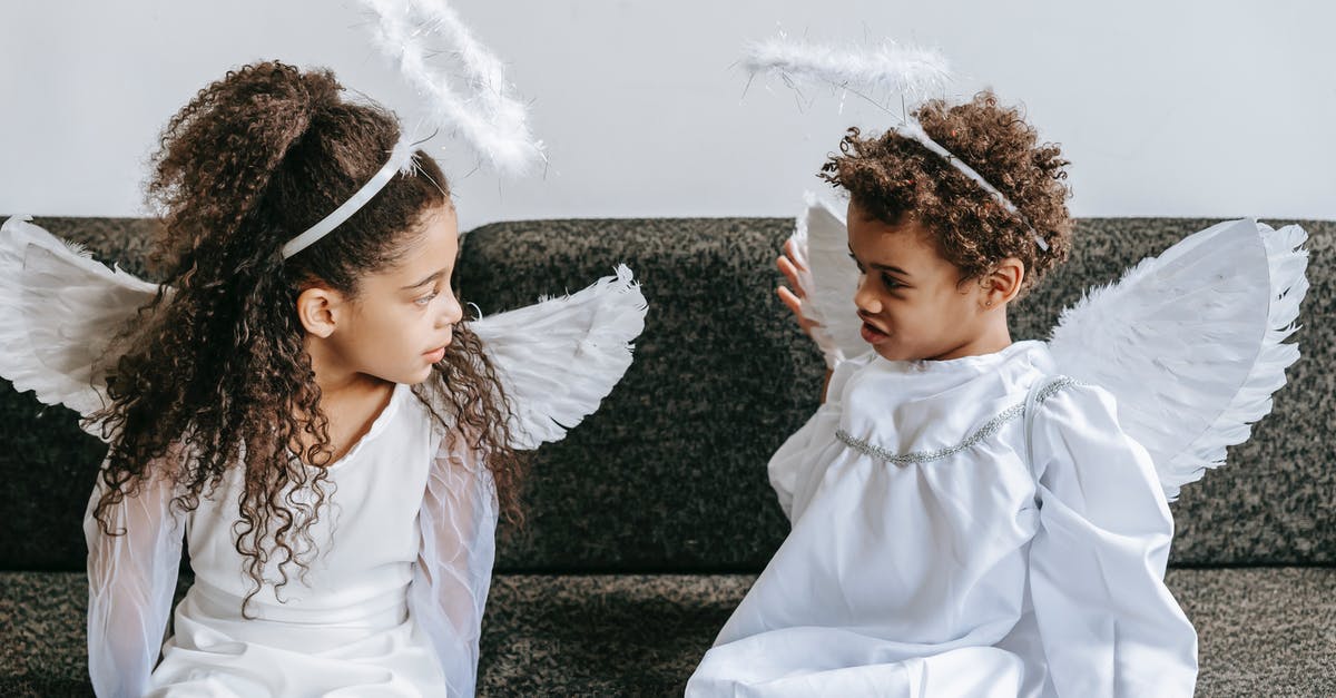 Did this character try to kill John Wick in chapter 3, and did this other character approve it? - Cute little black siblings in angels costumes playing on couch