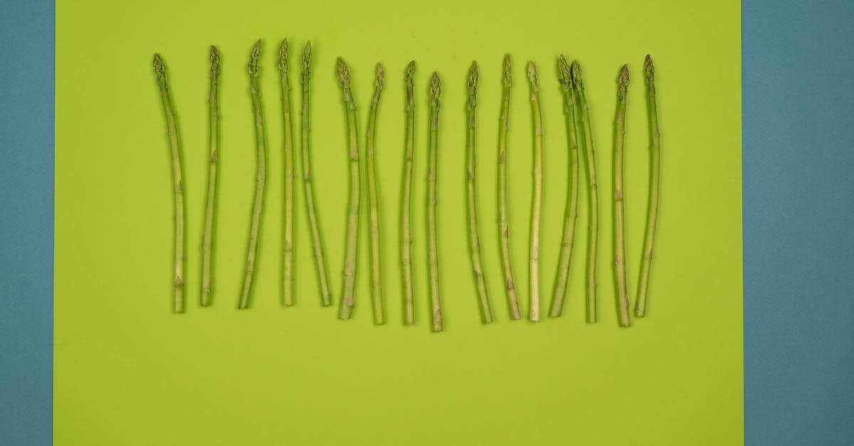 Disambiguation between two similar documentaries "World War 2 In Colour" - Row of fresh asparagus stems on green surface