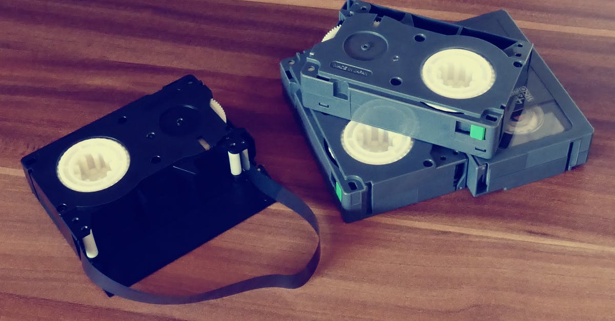Do movie soundtracks video clips follow the movie's age rating? - Betamax Tapes on Top of Brown Wooden Surface