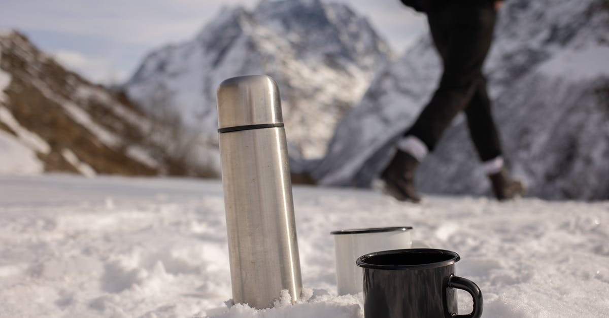 Do we know who died in the season 6 finale of The Walking Dead? [closed] - Thermos Near Ceramic Mugs on Snow Covered Ground
