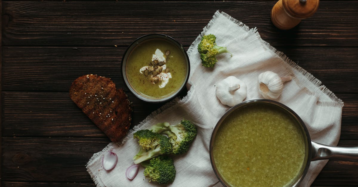 Does Bryan Mills just make a massively lucky guess that Marko's gang had an arrangement with the authorities? - Top view of saucepan with broccoli puree soup on white napkin with garlic and toasted bread slice