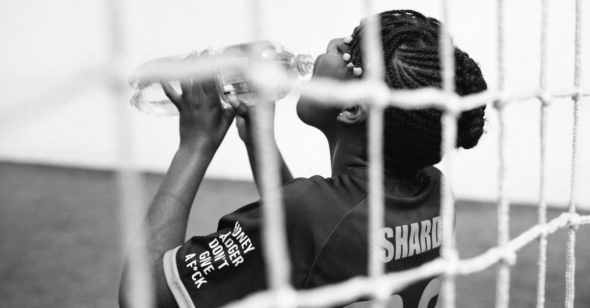 Does Kanima's mythology match any historical stories/works or is it only written for Teen Wolf? - Black and white back view of young female goalkeeper drinking water from plastic bottle