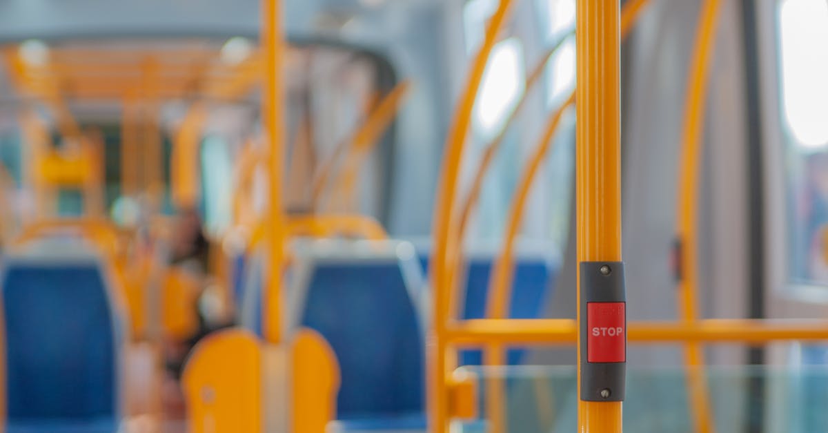 Does Rogue One reference A New Hope in the way the Death Star's firing is depicted? - Red stop button on yellow handrail in modern empty public bus during daytime