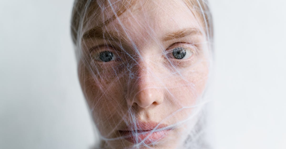 Does Spider-Man (or Peter Parker) have a problem with real spiders? [closed] - Close-Up Photo of a Helpless Woman Trapped in a Spider Web
