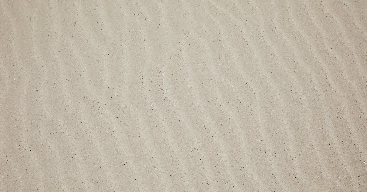 Does the Dune movie from 2021 assume any prior knowledge? - Top view of empty dry plain surface of beach covered with sand in daytime