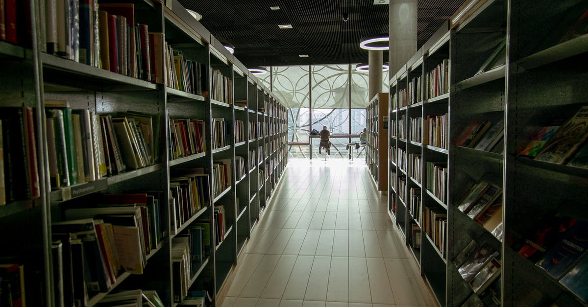 Does the passage of time affect humans differently in Oz? - Interior of library with bookshelves
