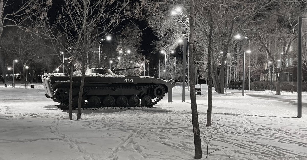 Eastern European cold war movies - Grayscale Photo of a Tank Near Trees