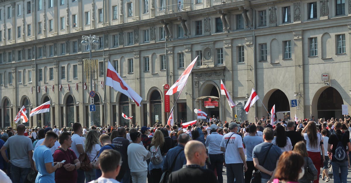 Flags in Kim Possible (2019) - People with Flags on Demonstration near City Administration Building 