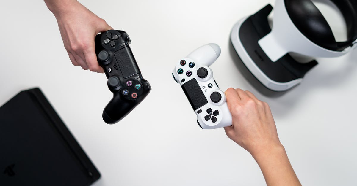 Game Over, Man...Game Over! - What's the source? - Person Holding White and Black Xbox One Game Controller