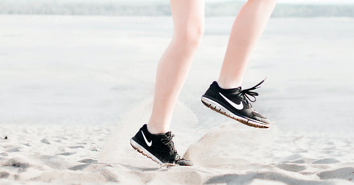 Girl is drugged and on the run with the protagonist [closed] - Photo of Woman Wearing Pair of Black Nike Running Shoes