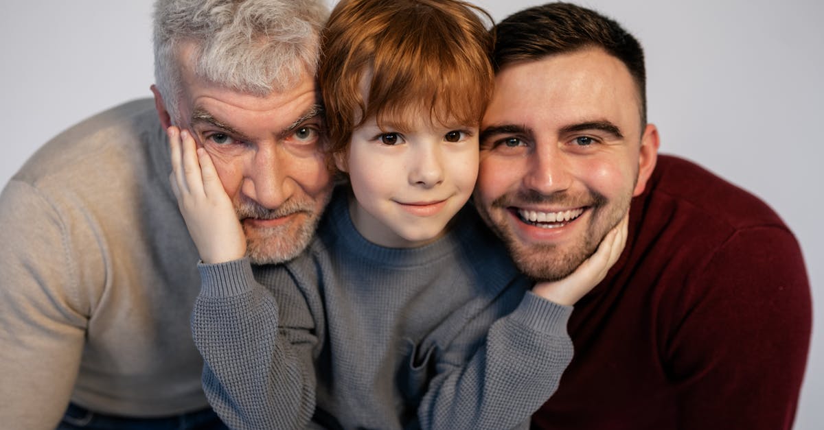 Grandfather Unable to Look at Grandson - A Family Smiling