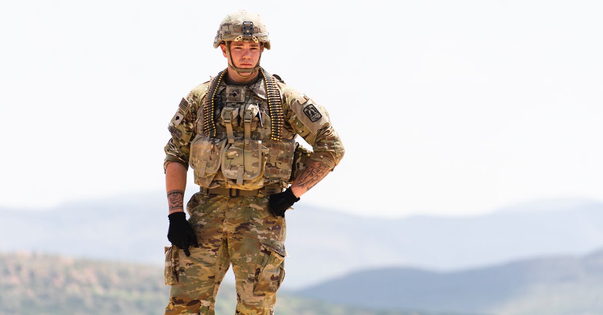 Has any real-life US military unit committed Die-Hard-2-level treason? [closed] - Unarmed US Soldier in Field Camo Uniform with Mountains in Background