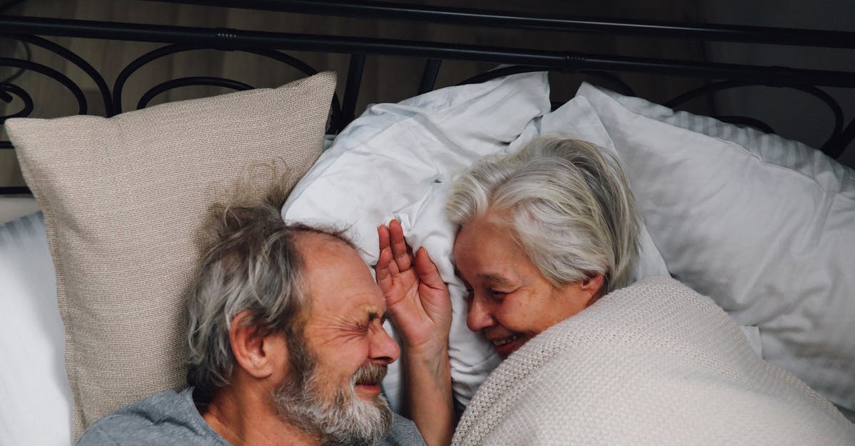 Has Ashton Kutcher retired from acting? [closed] - `Elderly Couple Facing Each Other and Smiling in Bed