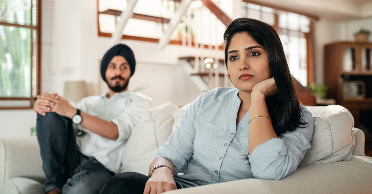 Has The Academy ever addressed the issue with acting categories being gender separated? - Offended young Indian female sitting on couch with husband