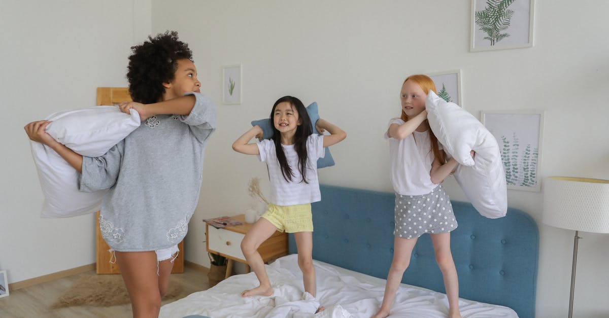 Have there been other candidates to play Jack Reacher? - Full body of cheerful multiracial girls using pillows while playing in bright cozy room in daytime