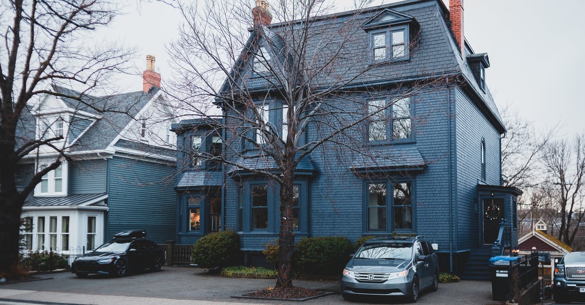 House of Cards season 3 release policy - Street with cottages and trees near pavement with cars