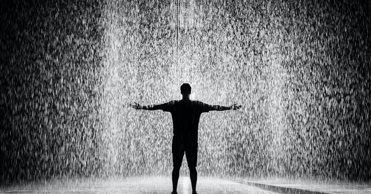How accurate was the portrayal of Autism in Rain Man? - Silhouette and Grayscale Photography of Man Standing Under the Rain