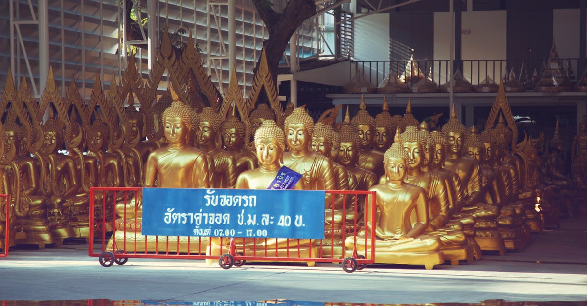 How are servants of the Many Faced God employed? - Many golden Buddha statues kept in spacious storehouse