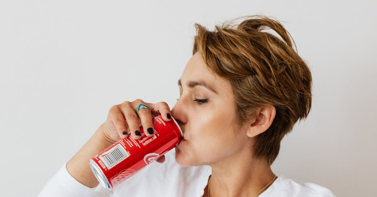 How can I link The Ring Two (2005) and Rings (2017)? - Thirsty woman enjoying coke from colorful can