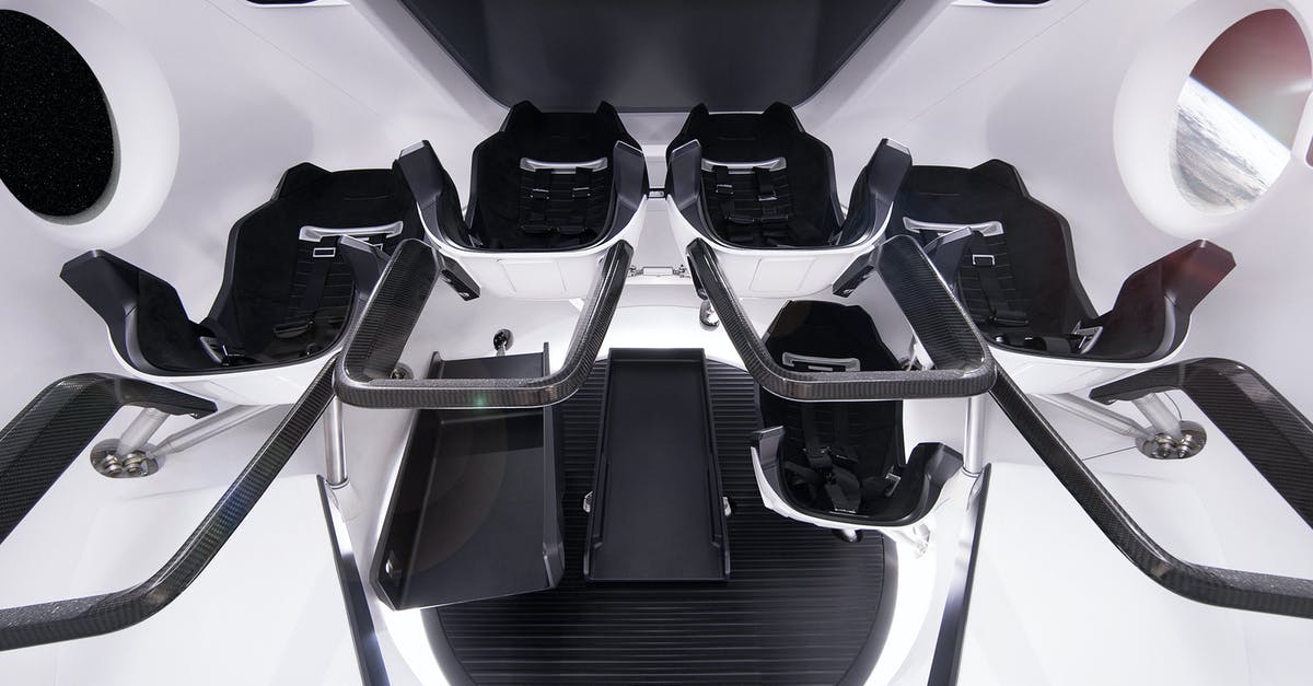 How can the future protect themselves by wiping out the past in Tenet? - From below of comfortable astronauts chairs inside of modern spacecraft simulator located in modern station