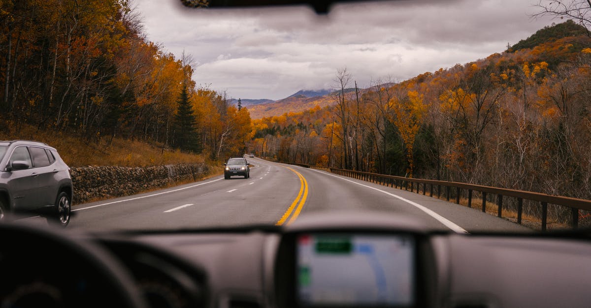 How come the Beast allows Belle to ride off through the woods ridden with wolves to rescue her father? - Car riding on highway through autumn forest