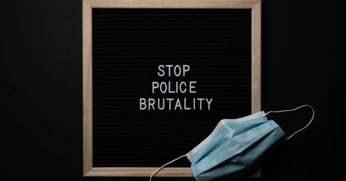How could Andy's right to appeal his sentence be denied to him by the warden? - Top view composition of framed black image with white text Stop Police Brutality near medical protective mask