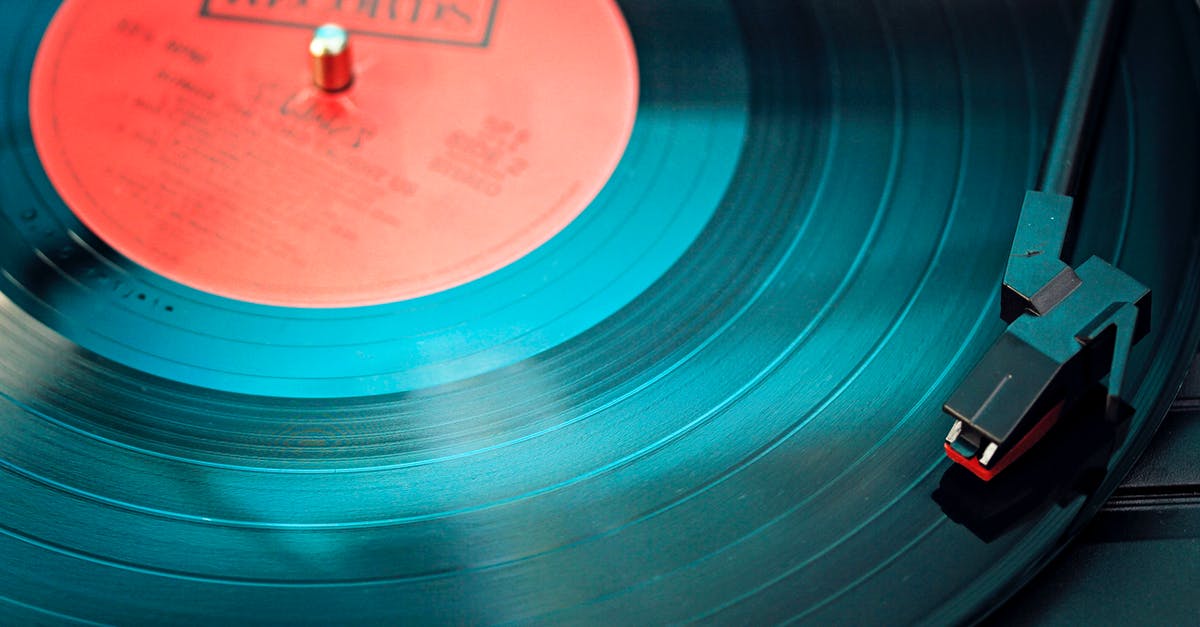 How did a vinyl record start a fire? - Blue Vinyl Record Playing on Turntable