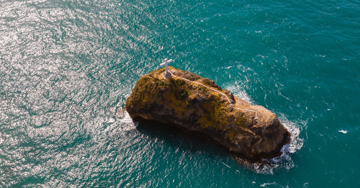 How did an inverted cross appear on Frenchie's neck? - Aerial Photo of St. Appearance Rock in Russia
